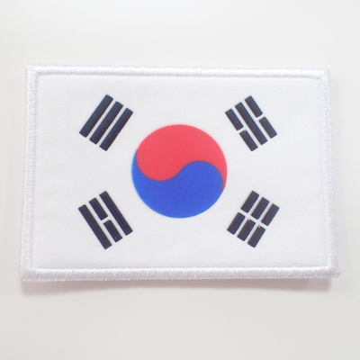 Corrections faites sur commande populaires de broderie de drapeau national pour le sac de chapeau de vêtements