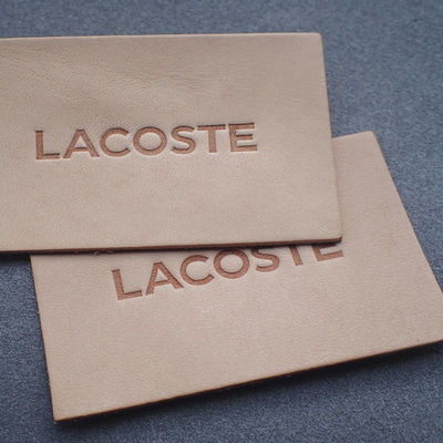 OEKO viable a gravé les étiquettes en refief en cuir pour des jeans
