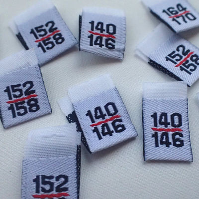 Cousez sur la mitre de coton plient les étiquettes imprimables d'habillement